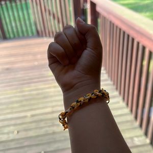 Orange white an black bracelet